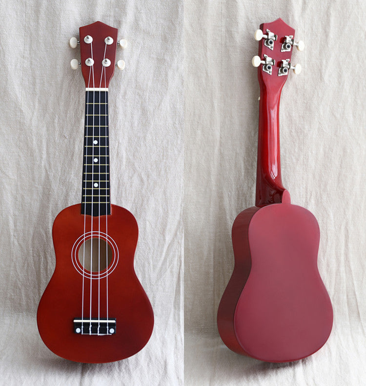 A wooden guitar for children.