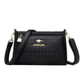 Sheila Merchandise black textured purse for every occasion with adjustable strap and gold accents