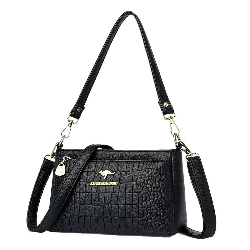 Black textured leather purse for every occasion with adjustable straps by Sheila Merchandise