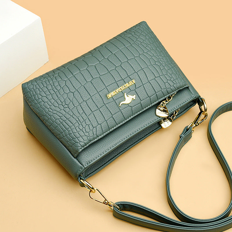 Sheila Merchandise green crocodile texture purse for every occasion with gold accents and shoulder strap