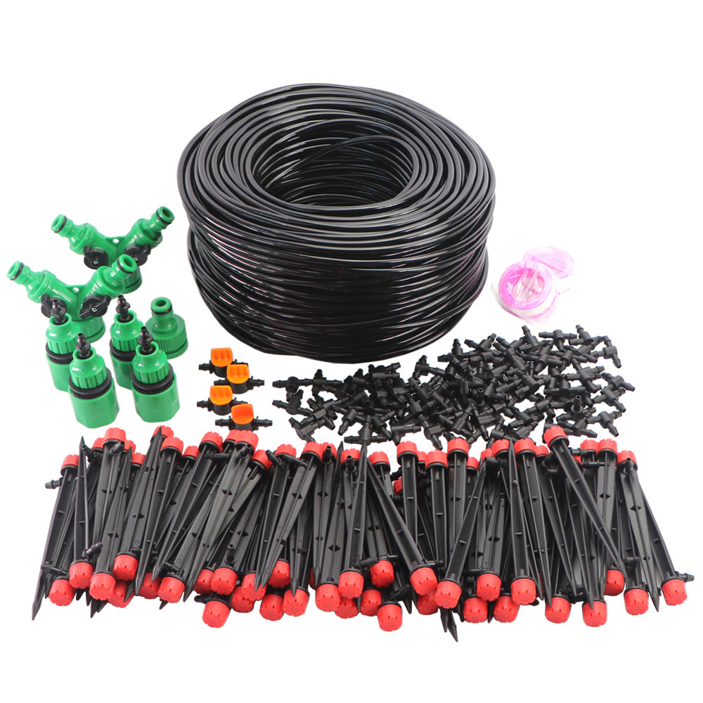 Automatic garden irrigation system kit with tubing, green connectors, red-tipped stakes, and black drip emitters