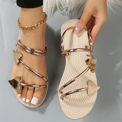 Heart shape summer sandals with metallic straps and gold accents cute beach flats for women