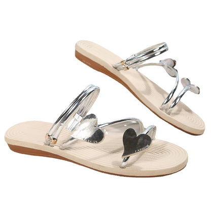 Sheila Merchandise heart shape summer sandals featuring silver straps and cute beach flats for women
