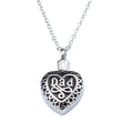 Silver heart urn pendant for ashes with Dad engraving and decorative details on a chain necklace