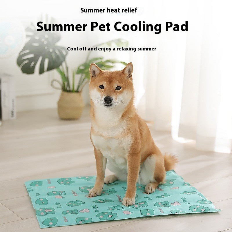 Shiba Inu dog sitting on a blue dog cooling gel pad with cartoon prints in a bright room