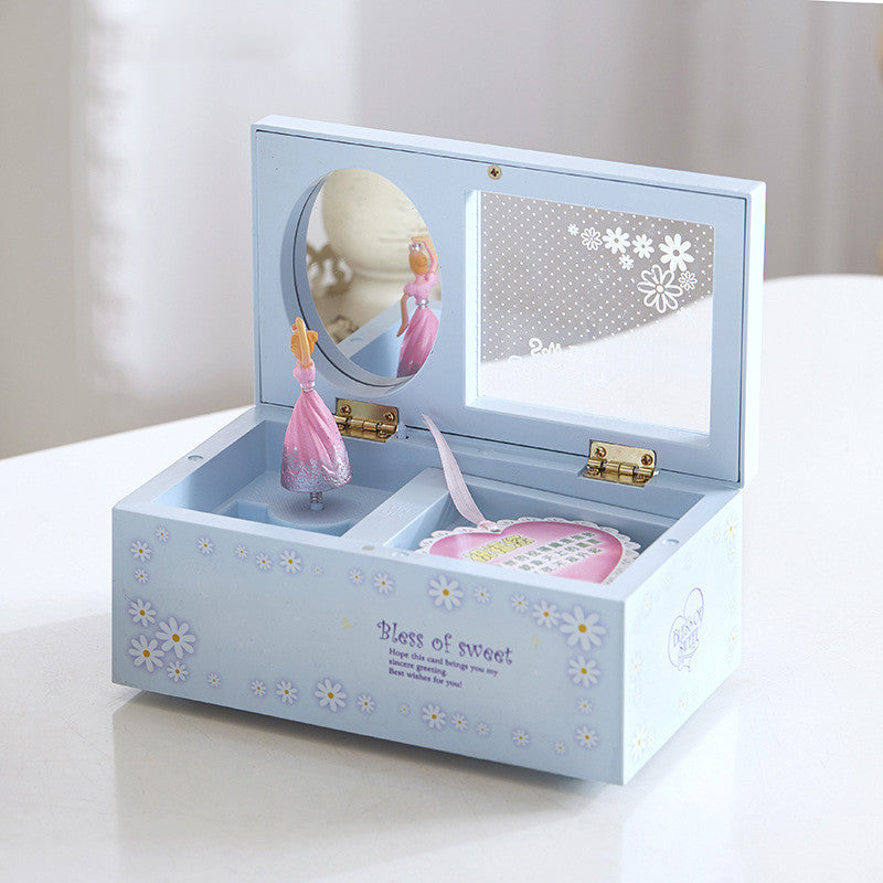 Sheila Merchandise musical ballet dancer box in light blue with floral designs and a pink ballerina figure inside