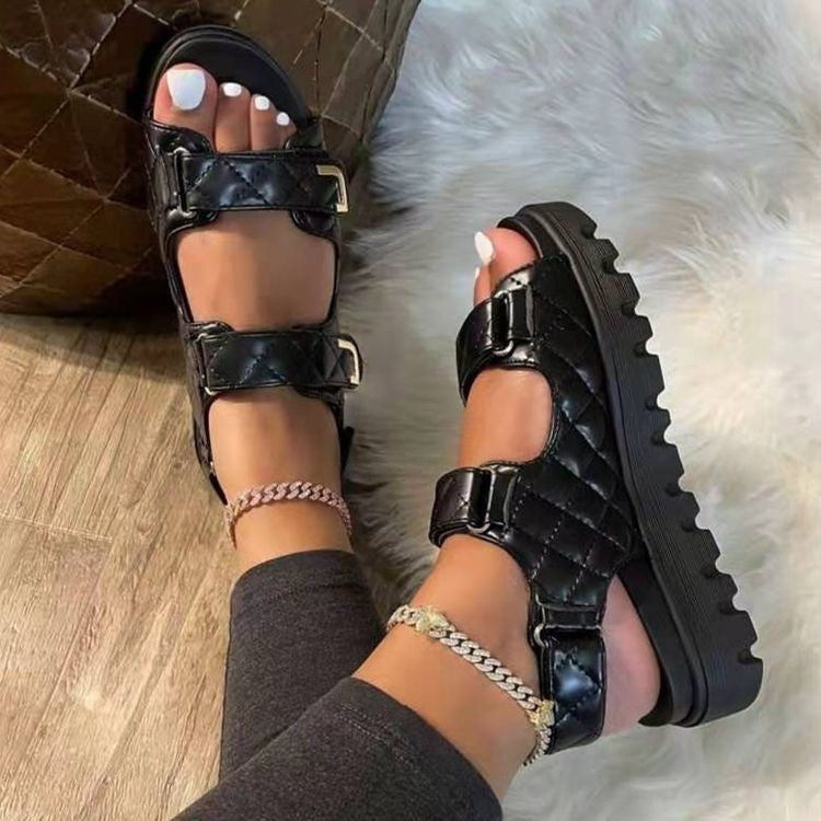 Black quilted platform sandals for every occasion with double buckle straps and chunky soles