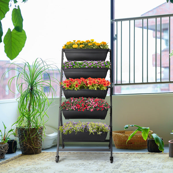Sheila Merchandise stackable garden beds in a stylish indoor setting filled with colorful flowers