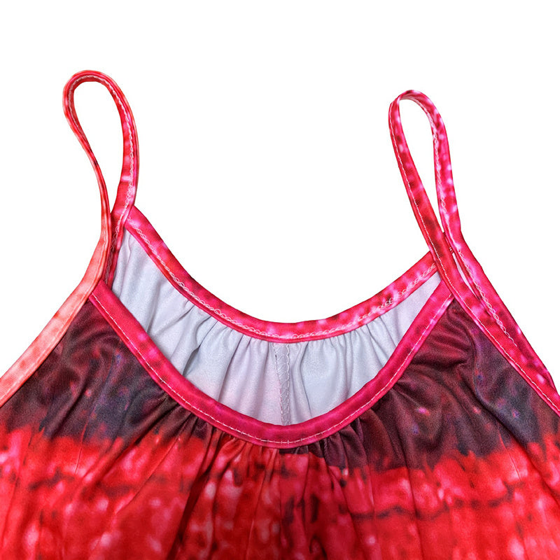 Close-up of red and pink tie-dye casual sleeveless jumpsuit for women with thin straps and gathered detailing