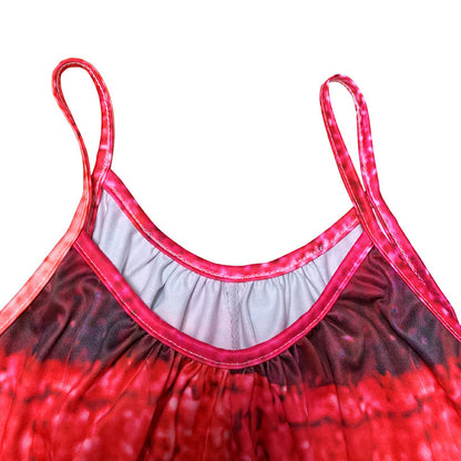 Close-up of red and pink tie-dye casual sleeveless jumpsuit for women with thin straps and gathered detailing