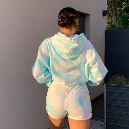 Sheila Merchandise casual tie-dye pullover hoodie in light blue and white worn outdoors